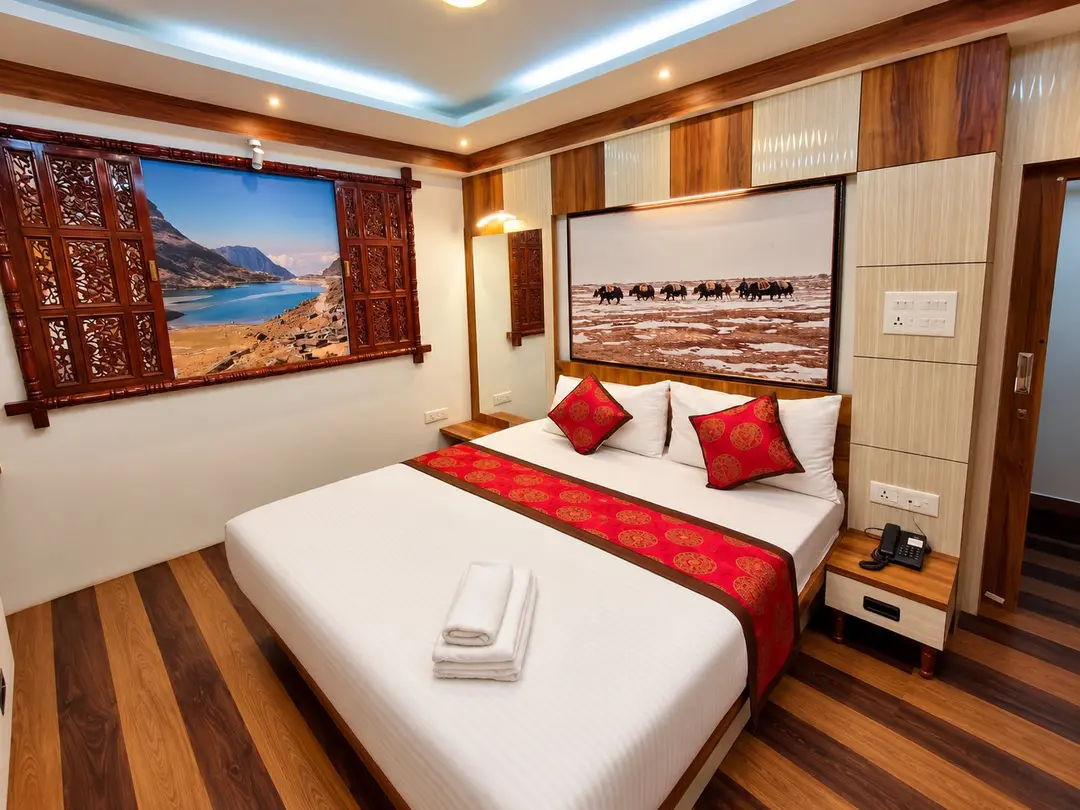Executive Room with timber panelling, a carved wooden window frame and striped wooden floor